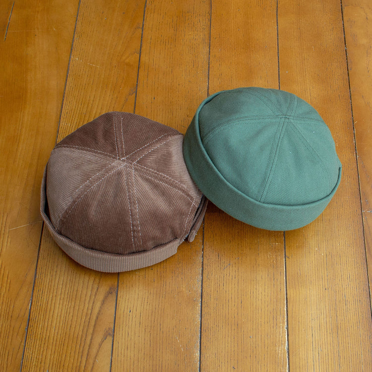 A selection of printable sewing patterns for hats, including bucket hats, docker caps, and unisex headwear.